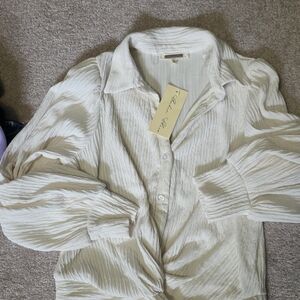 Elegant Cream Blouse by [Brand]